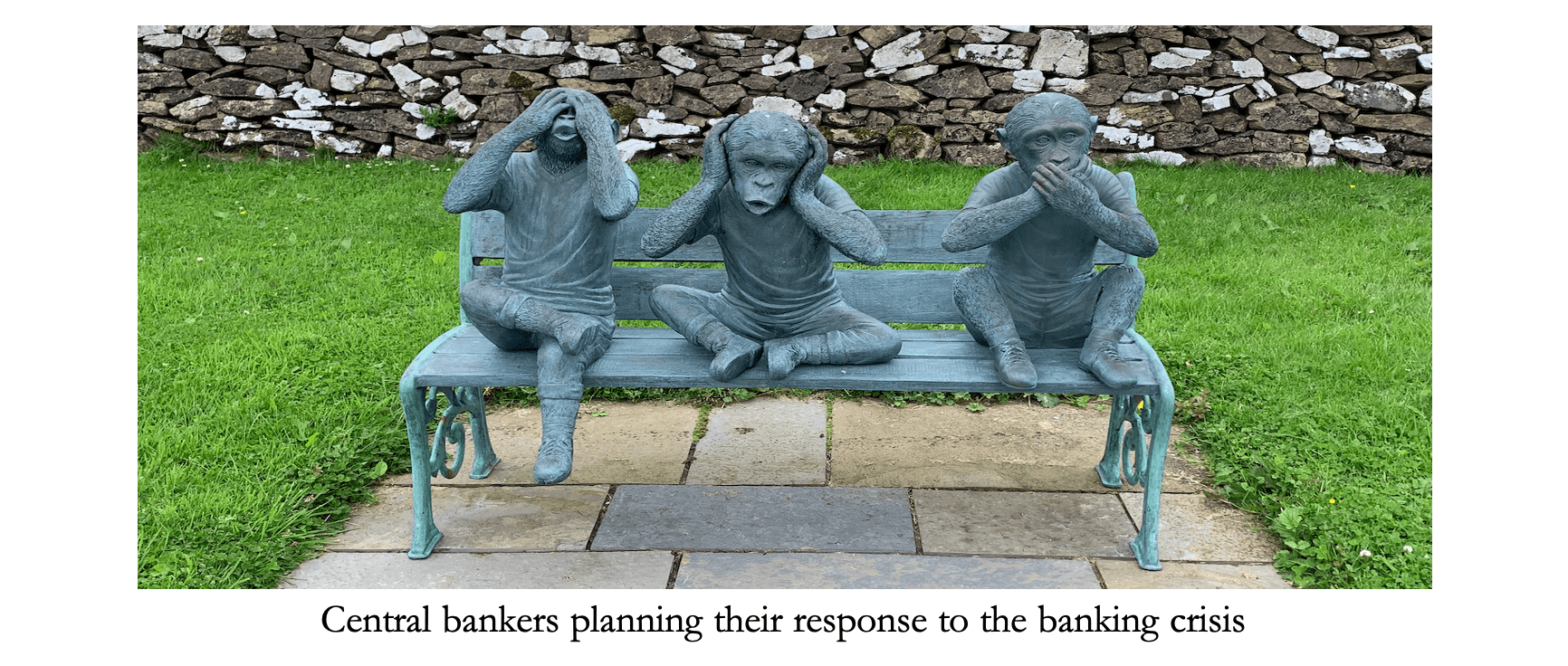 A group of statues on a bench

Description automatically generated with medium confidence